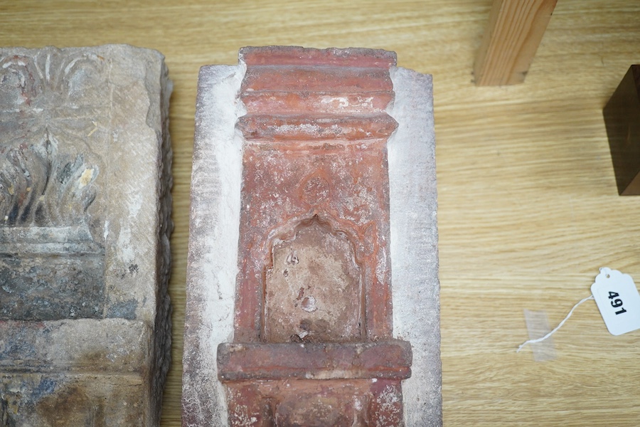 Two 19th century Indian carved sandstone niches, 33.5cm. Condition - fair